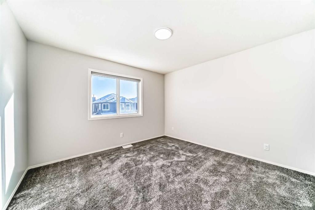 9 Saddlecrest Crescent Ne, Calgary, AB - Indoor Photo Showing Other Room