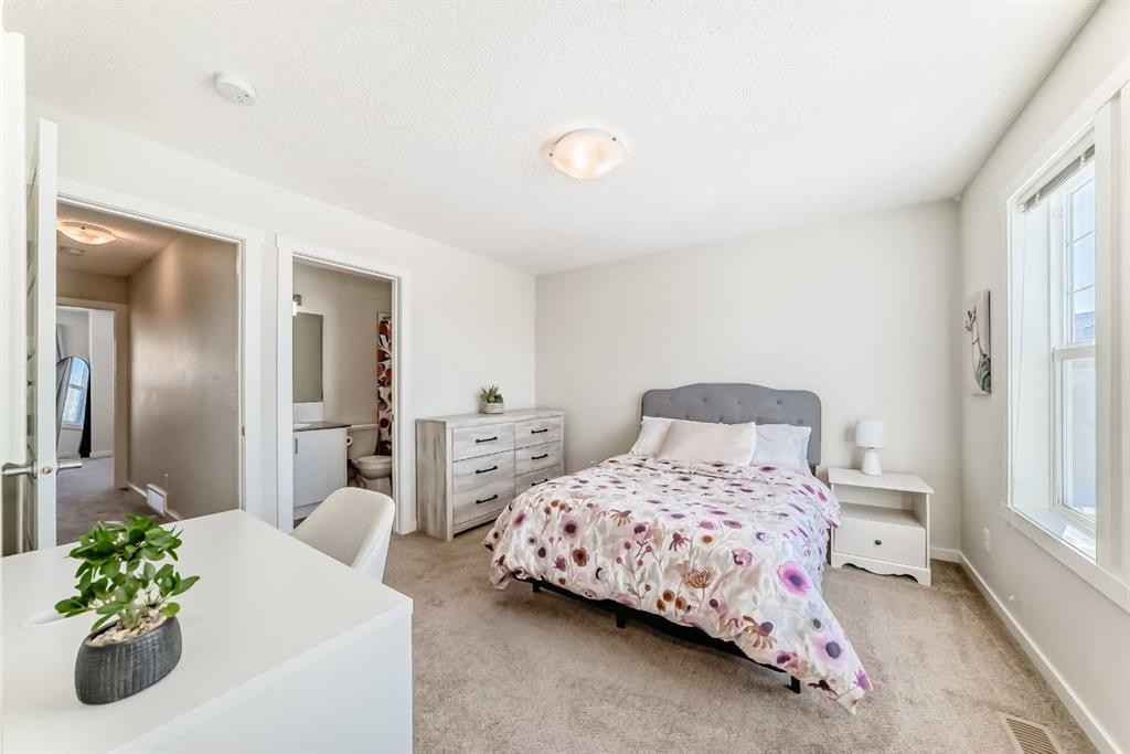 272 Cranbrook Square Se, Calgary, AB - Indoor Photo Showing Bedroom