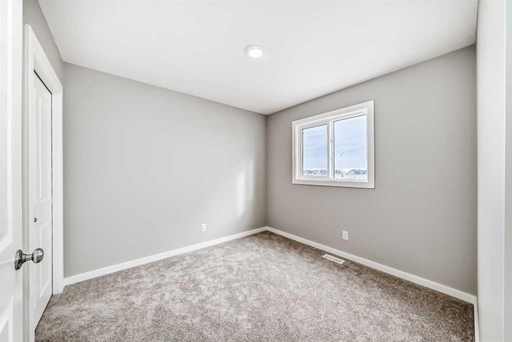 85 Starling Boulevard Nw, Calgary, AB - Indoor Photo Showing Other Room