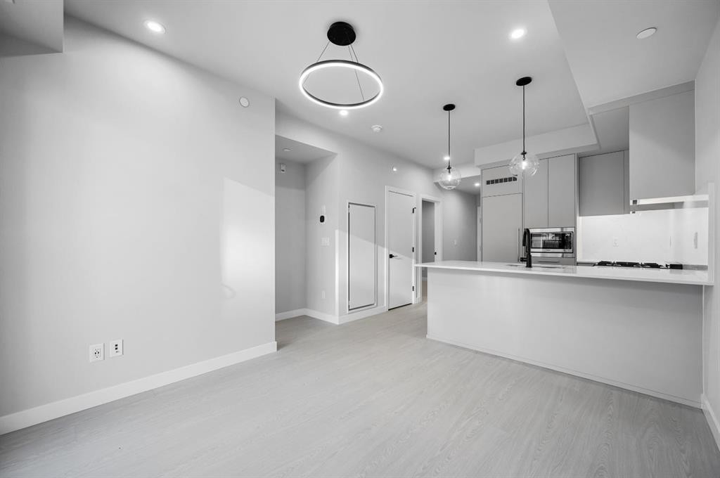 307-8375 Broadcast Avenue Sw, Calgary, AB - Indoor Photo Showing Kitchen With Upgraded Kitchen