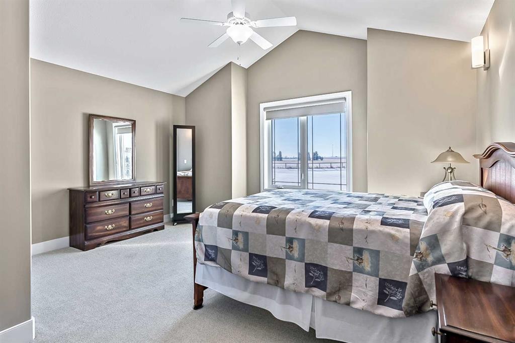 108 Ravencrest Drive, Rural Foothills County, AB - Indoor Photo Showing Bedroom