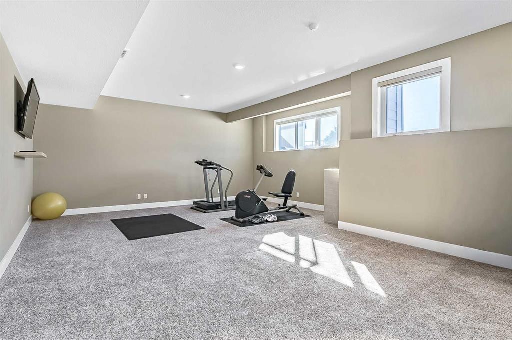 108 Ravencrest Drive, Rural Foothills County, AB - Indoor Photo Showing Gym Room