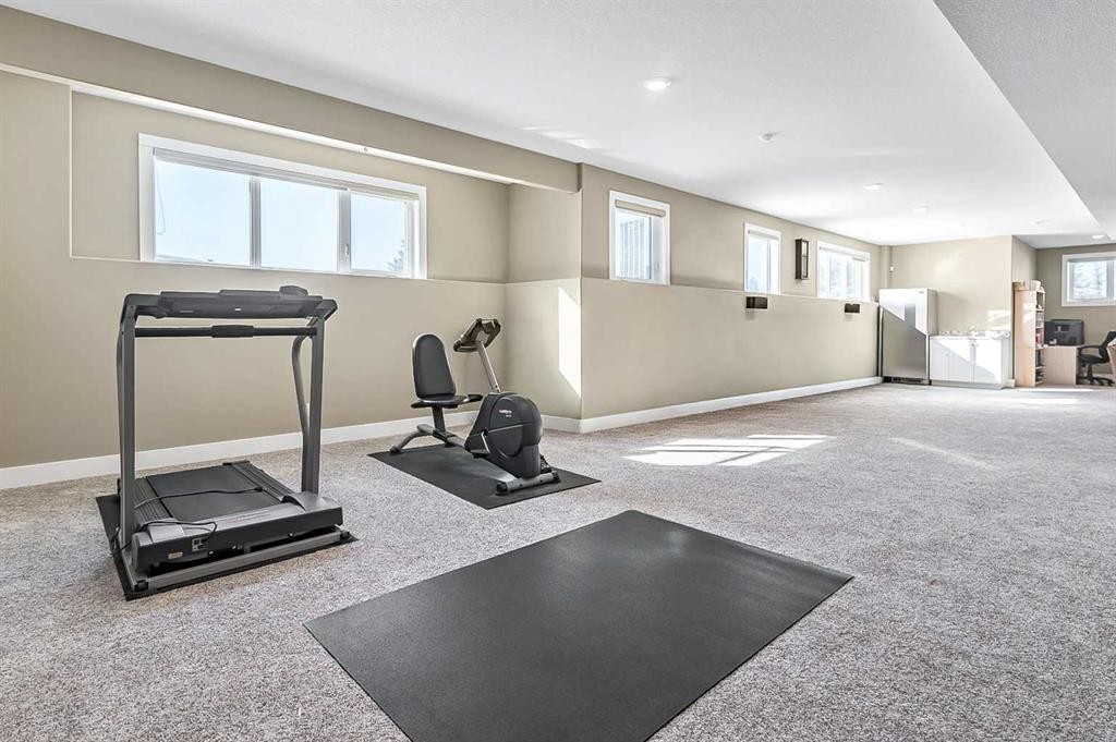 108 Ravencrest Drive, Rural Foothills County, AB - Indoor Photo Showing Gym Room