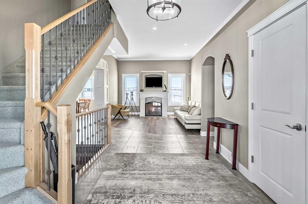 108 Ravencrest Drive, Rural Foothills County, AB - Indoor Photo Showing Other Room With Fireplace