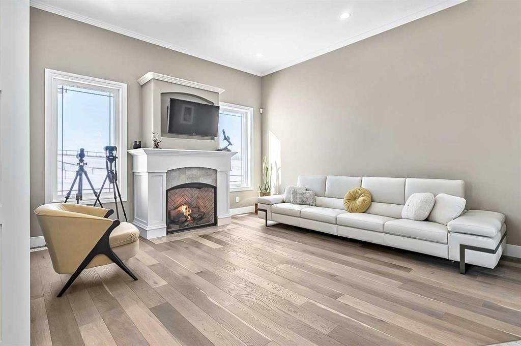 108 Ravencrest Drive, Rural Foothills County, AB - Indoor Photo Showing Living Room With Fireplace