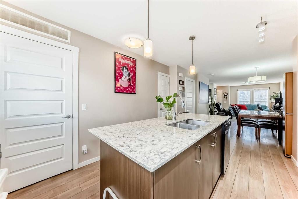 38 Auburn Bay Link Se, Calgary, AB - Indoor Photo Showing Kitchen With Double Sink
