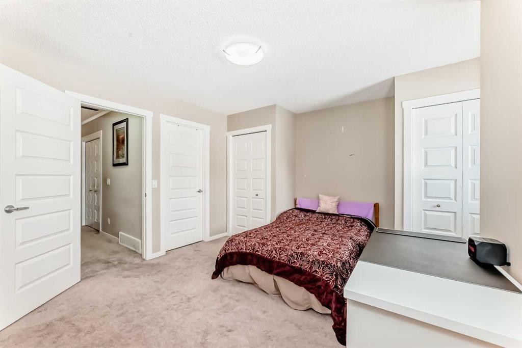 38 Auburn Bay Link Se, Calgary, AB - Indoor Photo Showing Bedroom