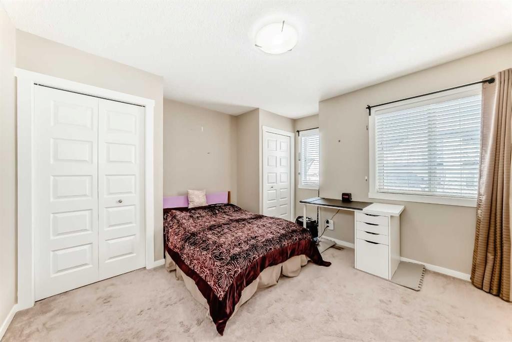 38 Auburn Bay Link Se, Calgary, AB - Indoor Photo Showing Bedroom