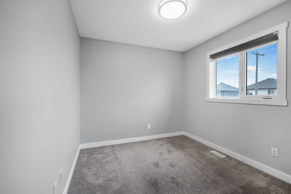 31 Saddleback Way Ne, Calgary, AB - Indoor Photo Showing Other Room