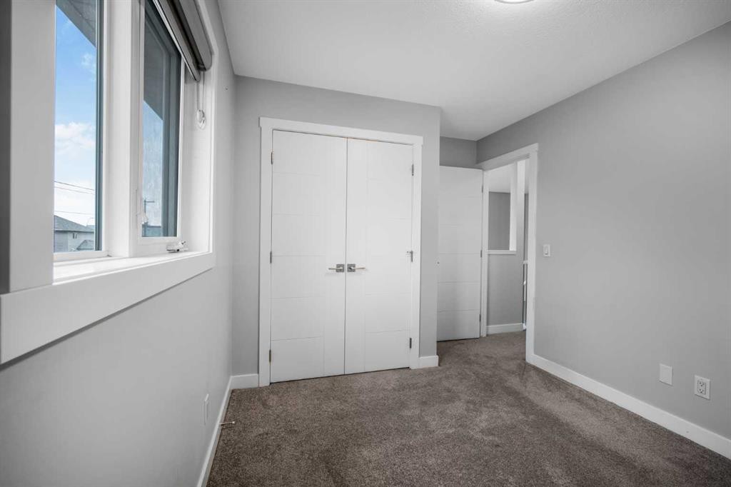 31 Saddleback Way Ne, Calgary, AB - Indoor Photo Showing Other Room