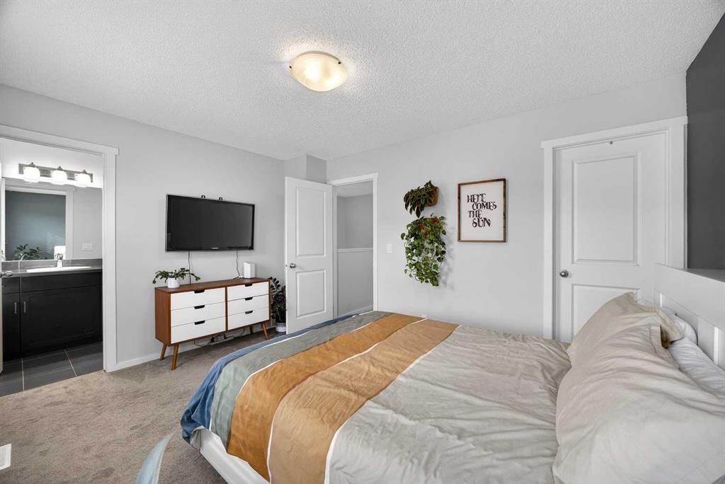 369 Walden Parade Se, Calgary, AB - Indoor Photo Showing Bedroom