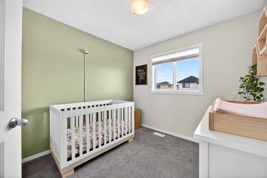 369 Walden Parade Se, Calgary, AB - Indoor Photo Showing Bedroom