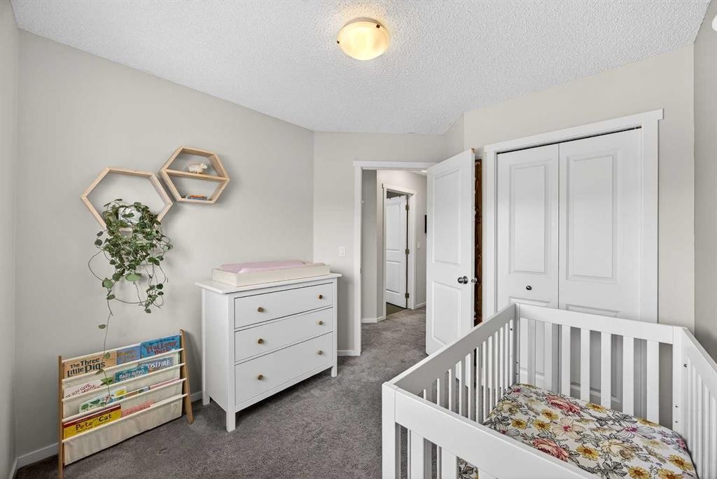 369 Walden Parade Se, Calgary, AB - Indoor Photo Showing Bedroom