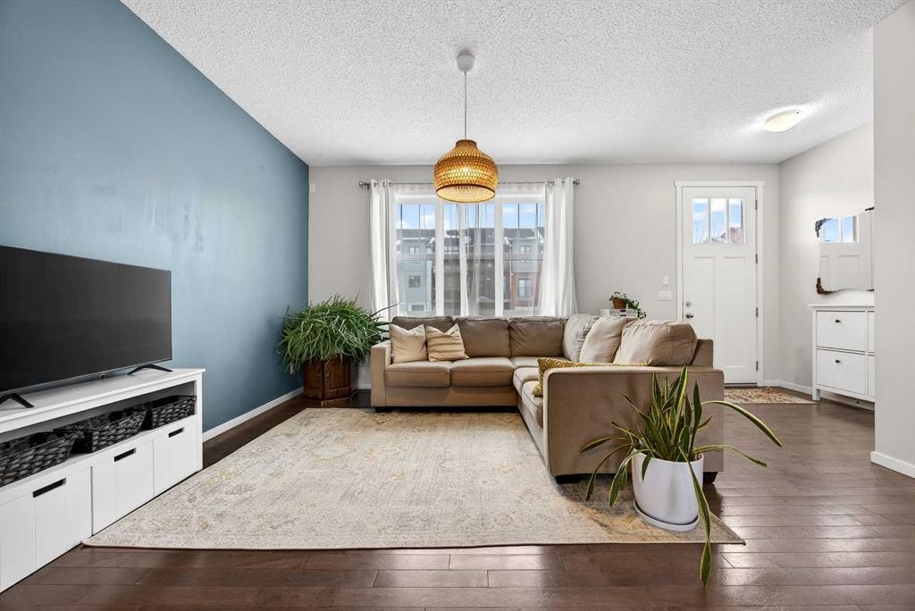 369 Walden Parade Se, Calgary, AB - Indoor Photo Showing Living Room