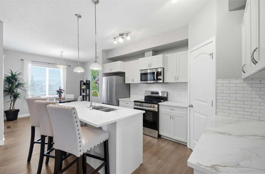 53-Sage Hill Common Nw, Calgary, AB - Indoor Photo Showing Kitchen With Stainless Steel Kitchen With Double Sink With Upgraded Kitchen