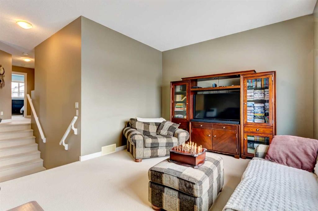 185 Brightonstone Landing Se, Calgary, AB - Indoor Photo Showing Living Room