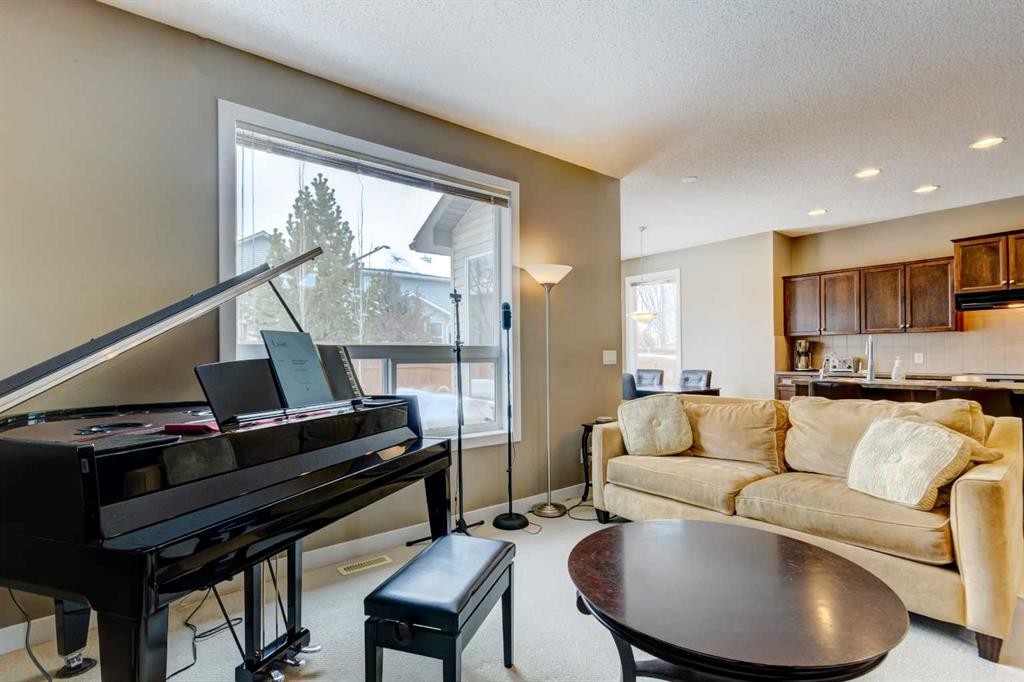 185 Brightonstone Landing Se, Calgary, AB - Indoor Photo Showing Living Room