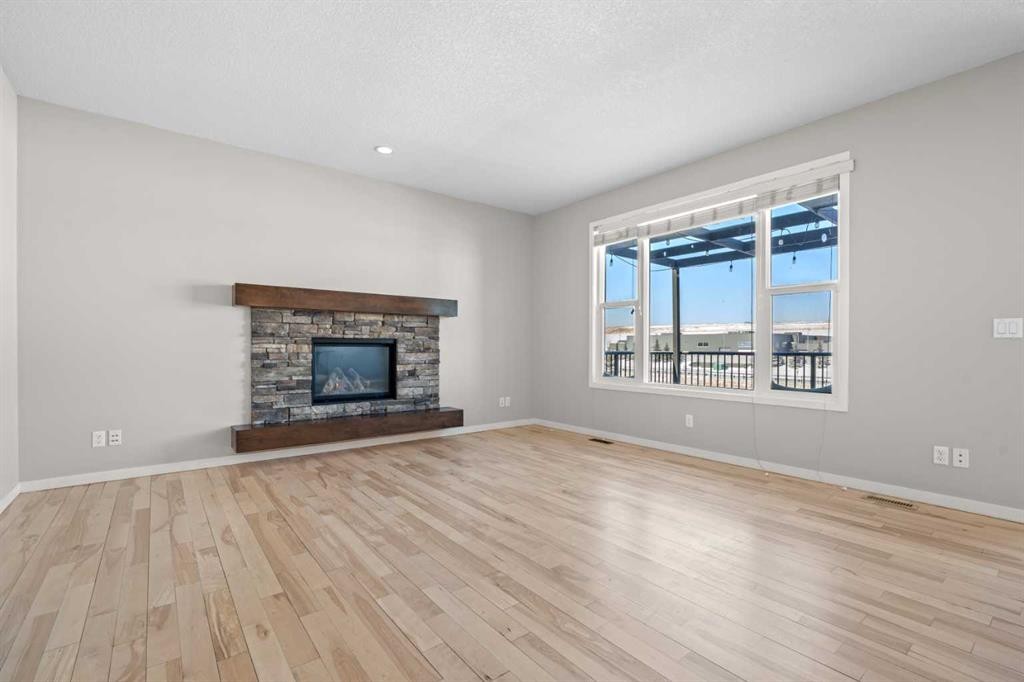 2148 Brightoncrest Green Se, Calgary, AB - Indoor Photo Showing Living Room With Fireplace