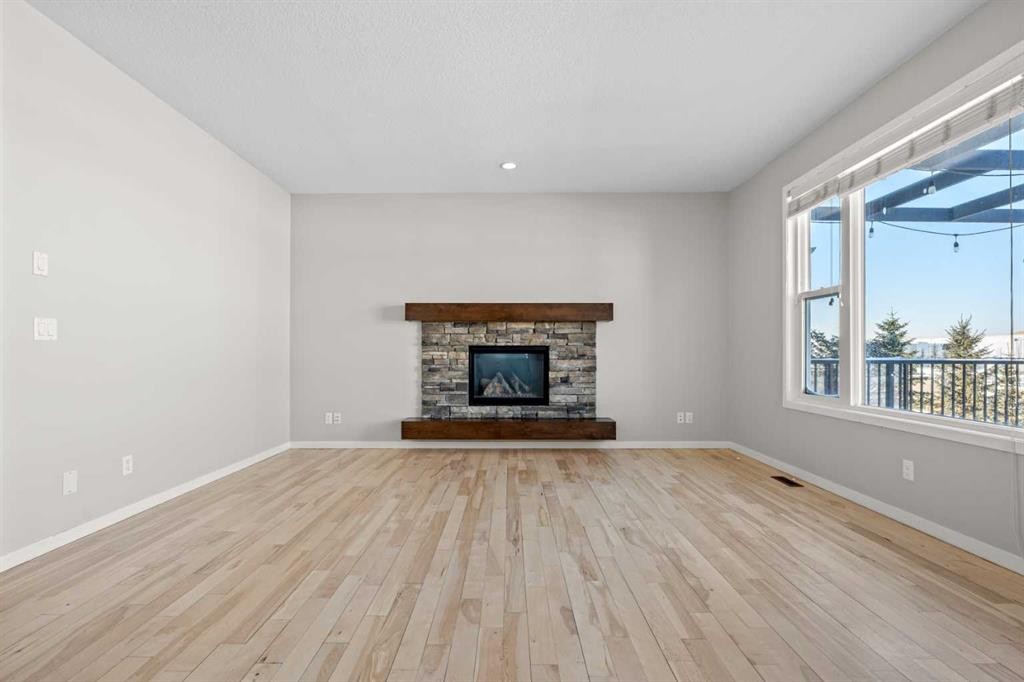 2148 Brightoncrest Green Se, Calgary, AB - Indoor Photo Showing Living Room With Fireplace