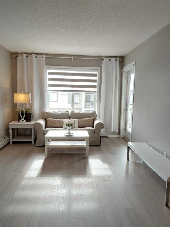 3416-81 Legacy Boulevard Se, Calgary, AB - Indoor Photo Showing Living Room