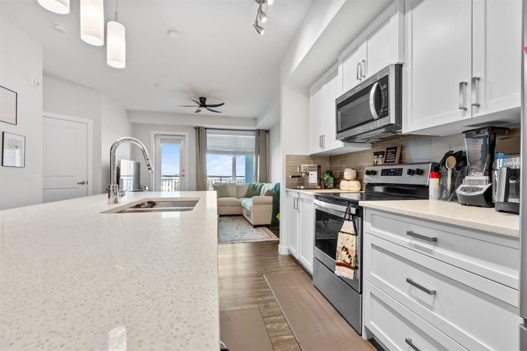 2310-3727 Sage Hill Drive Nw, Calgary, AB - Indoor Photo Showing Kitchen With Upgraded Kitchen