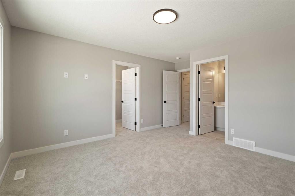 65 Amblefield Heights Nw, Calgary, AB - Indoor Photo Showing Other Room
