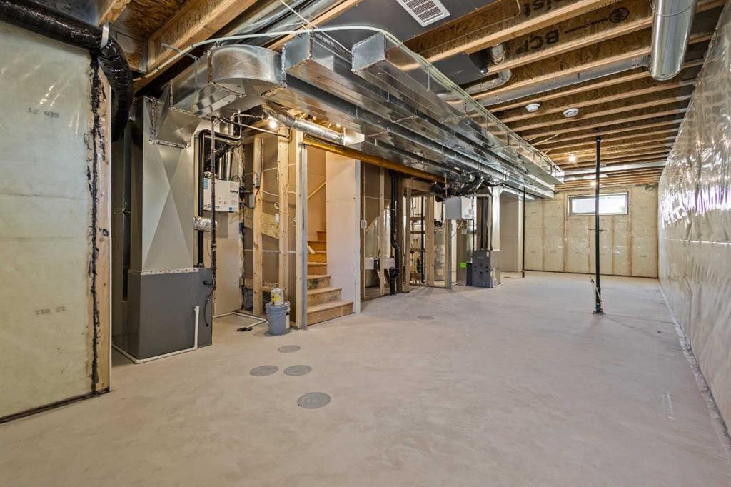 65 Amblefield Heights Nw, Calgary, AB - Indoor Photo Showing Basement