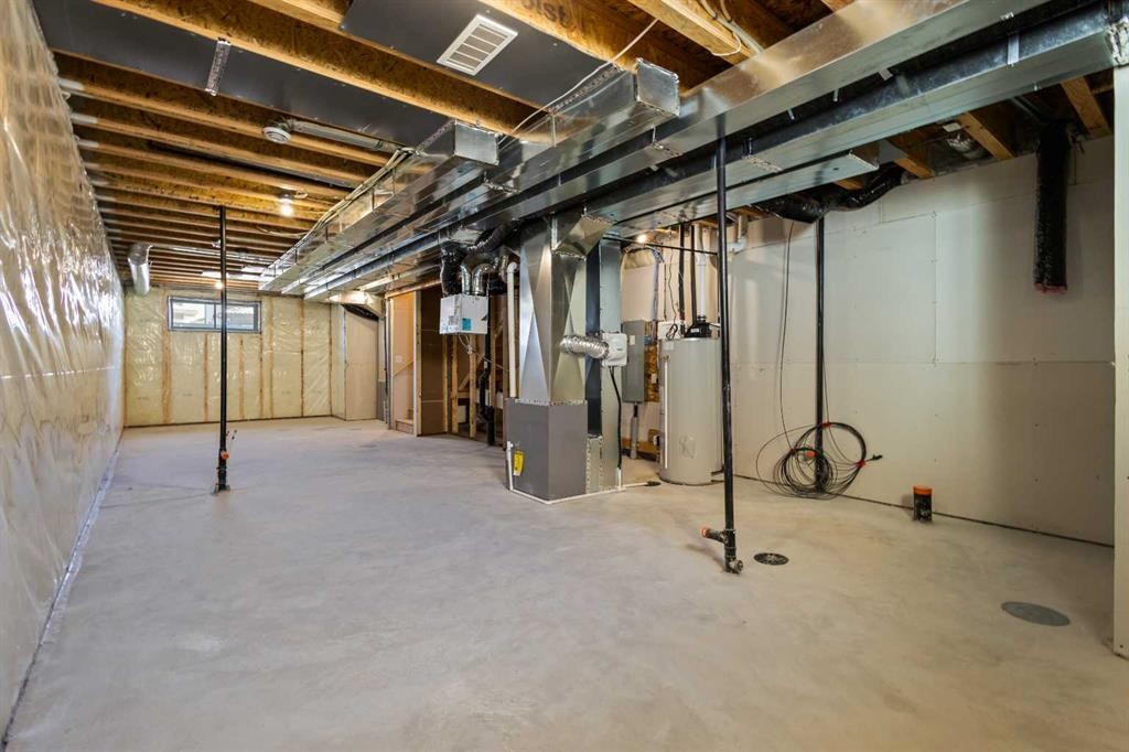 65 Amblefield Heights Nw, Calgary, AB - Indoor Photo Showing Basement