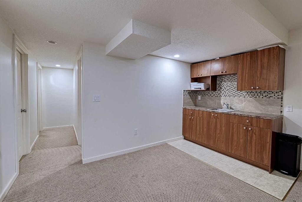 303 Saddlebrook Way Ne, Calgary, AB - Indoor Photo Showing Other Room