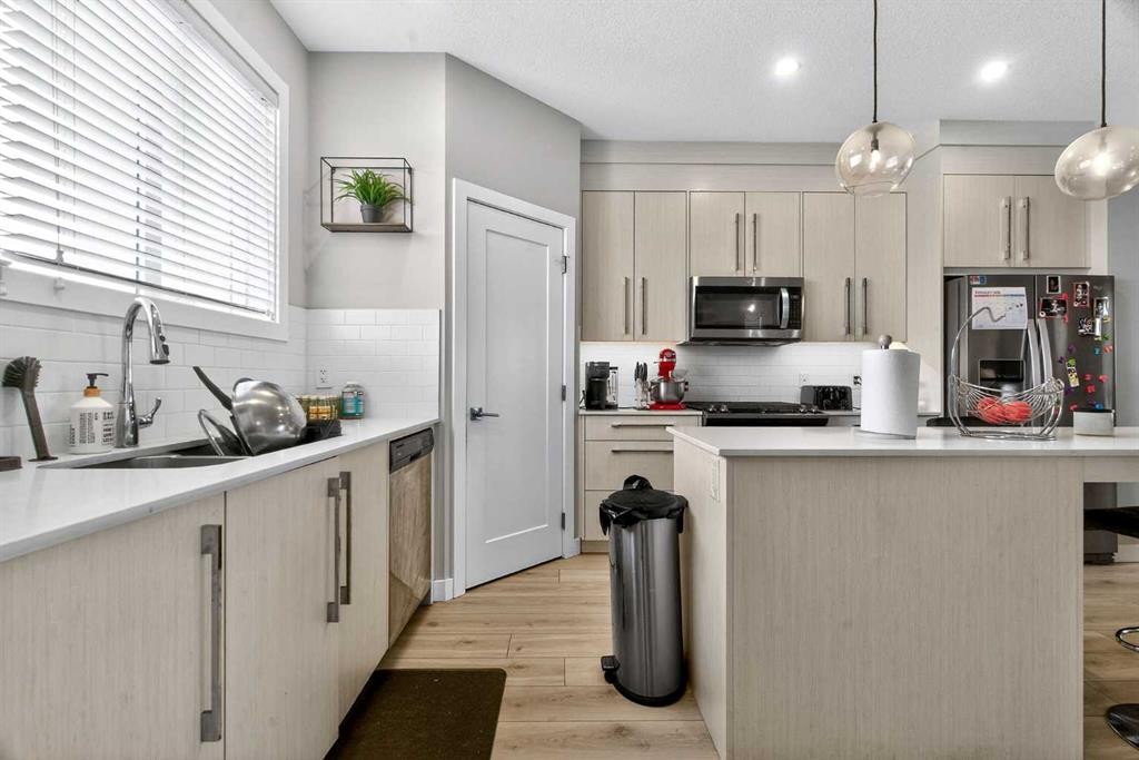 1220 Cornerstone Way Ne, Calgary, AB - Indoor Photo Showing Kitchen With Double Sink With Upgraded Kitchen