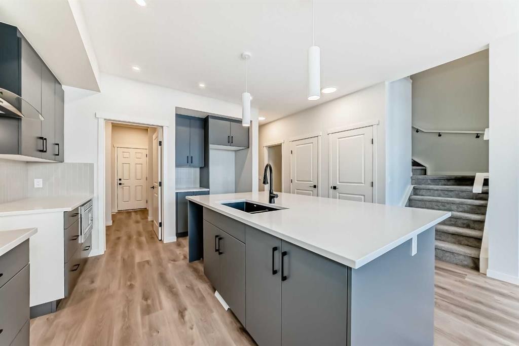 54 Bartlett Row Se, Calgary, AB - Indoor Photo Showing Kitchen With Upgraded Kitchen