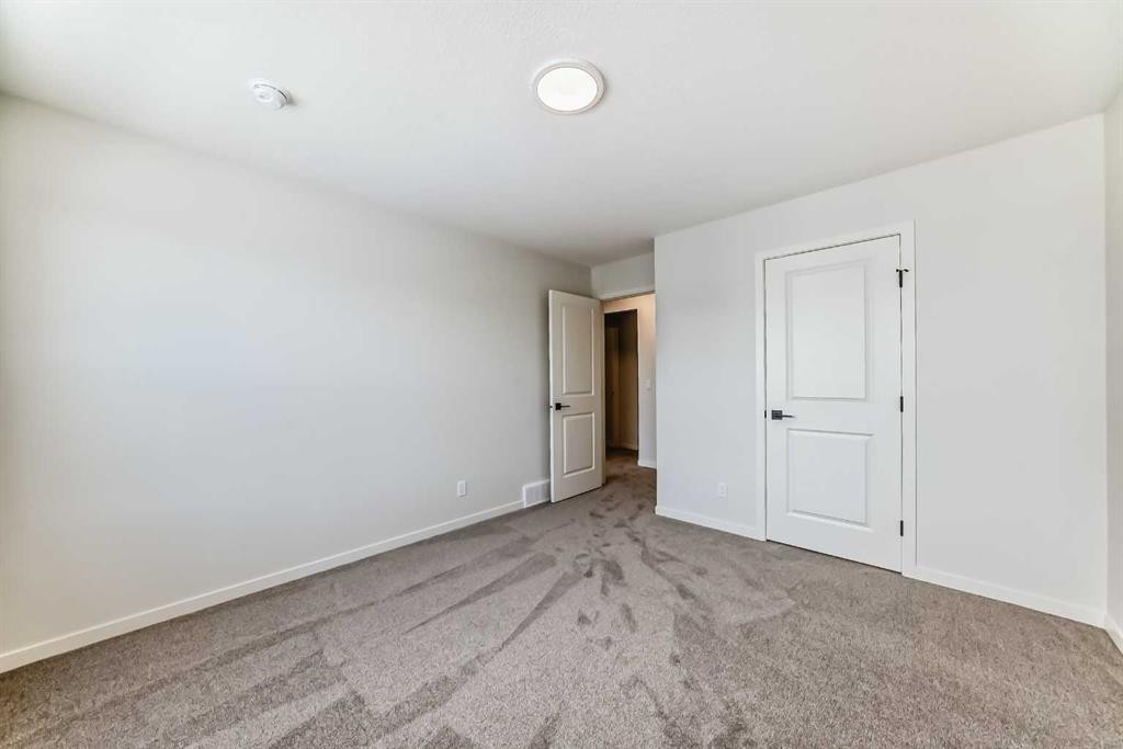 54 Bartlett Row Se, Calgary, AB - Indoor Photo Showing Other Room