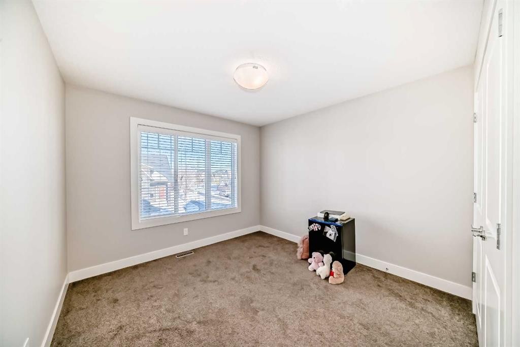 477 Legacy Boulevard Se, Calgary, AB - Indoor Photo Showing Other Room