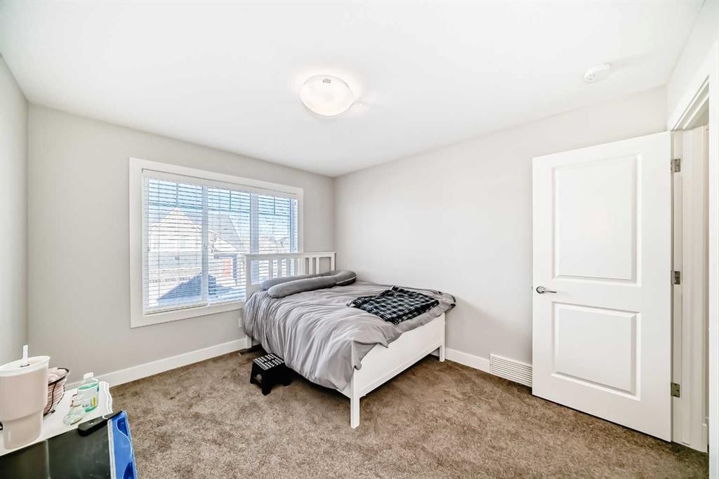 477 Legacy Boulevard Se, Calgary, AB - Indoor Photo Showing Bedroom