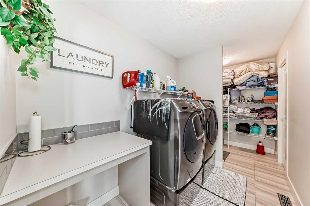 477 Legacy Boulevard Se, Calgary, AB - Indoor Photo Showing Laundry Room