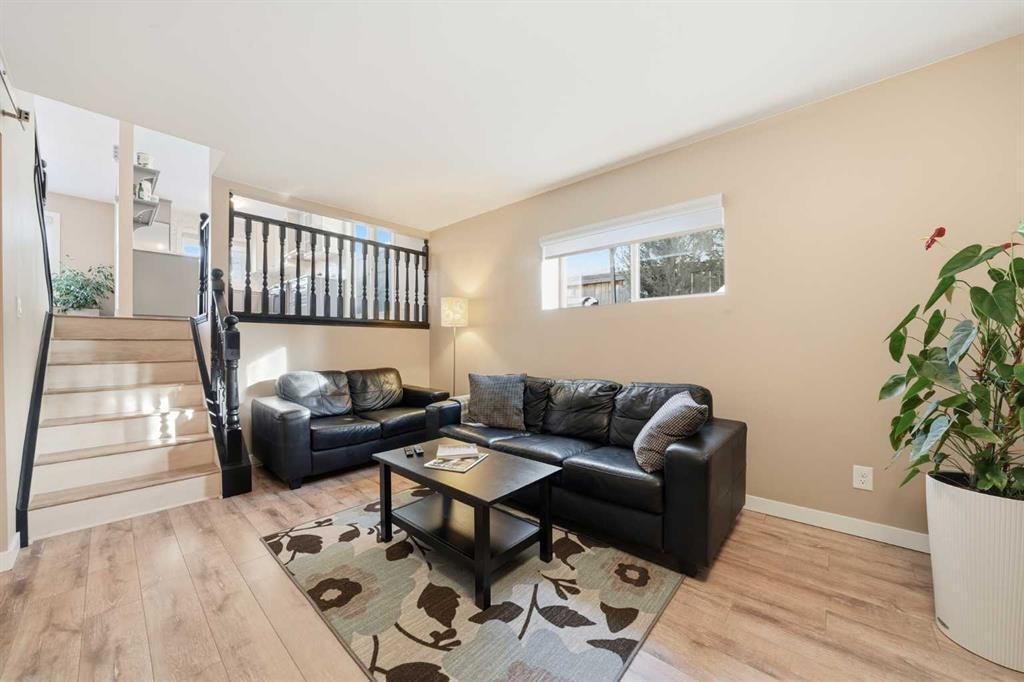 132 Shawcliffe Circle Sw, Calgary, AB - Indoor Photo Showing Living Room