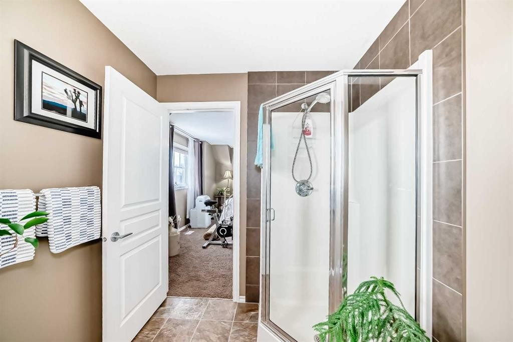 20 Mackenzie, Carstairs, AB - Indoor Photo Showing Bathroom