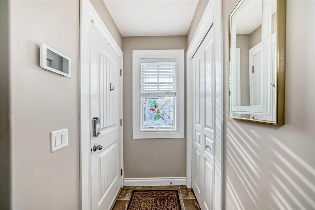 20 Mackenzie, Carstairs, AB - Indoor Photo Showing Other Room