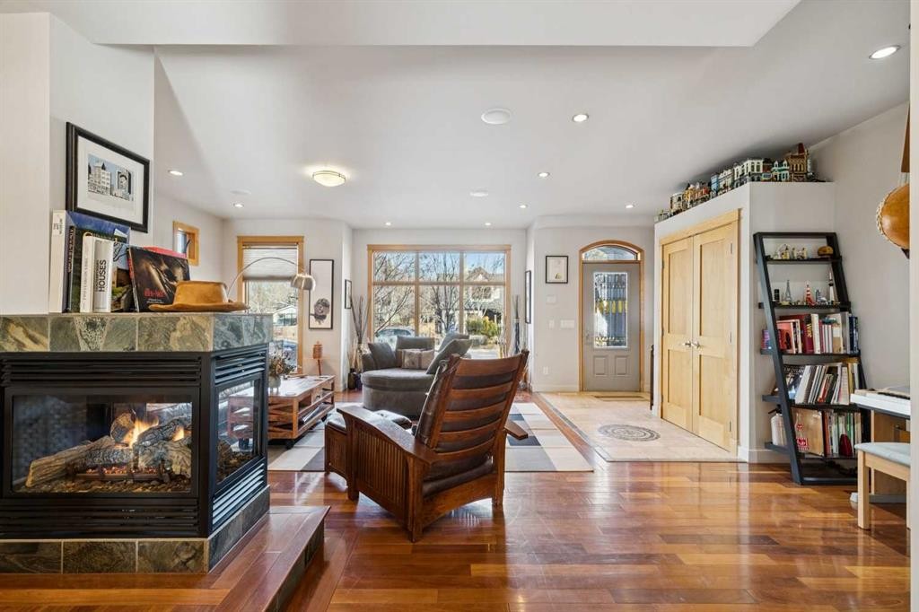 2407 Westmount Road Nw, Calgary, AB - Indoor Photo Showing Living Room With Fireplace