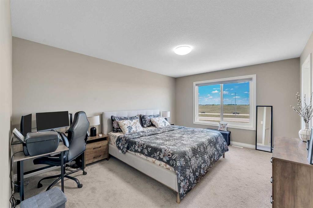 521 Corner Meadows Way Ne, Calgary, AB - Indoor Photo Showing Bedroom