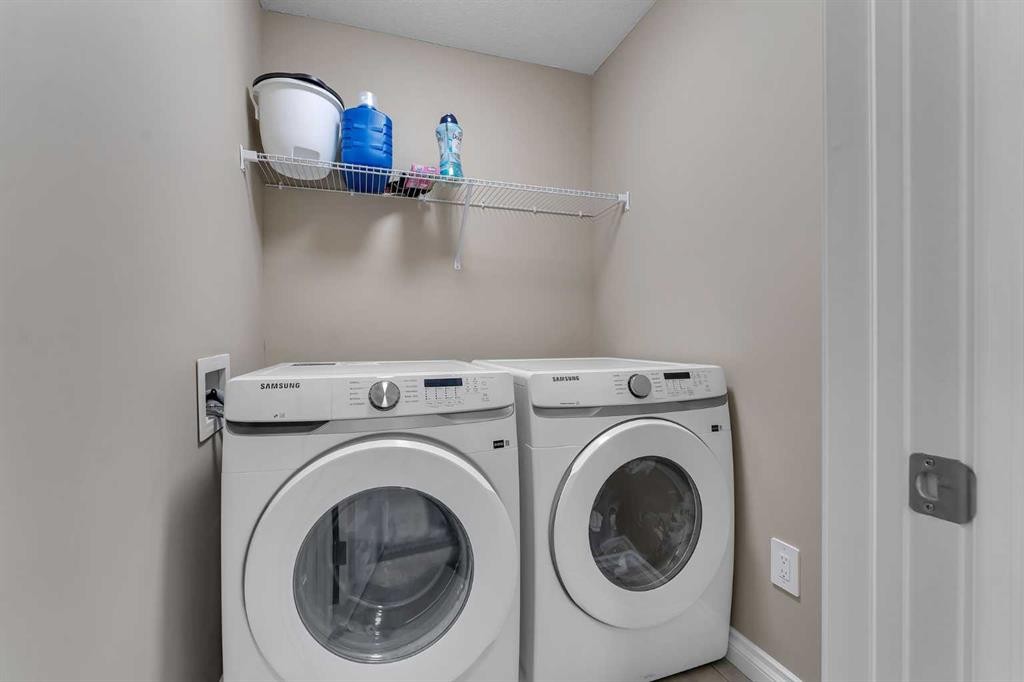 521 Corner Meadows Way Ne, Calgary, AB - Indoor Photo Showing Laundry Room