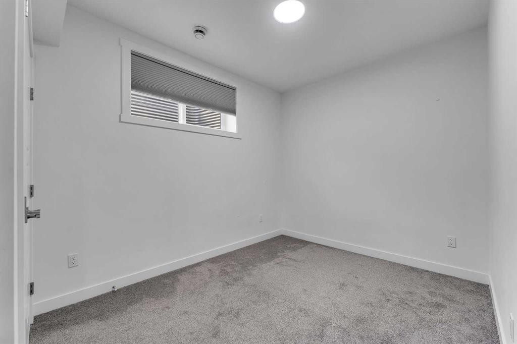 521 Corner Meadows Way Ne, Calgary, AB - Indoor Photo Showing Other Room
