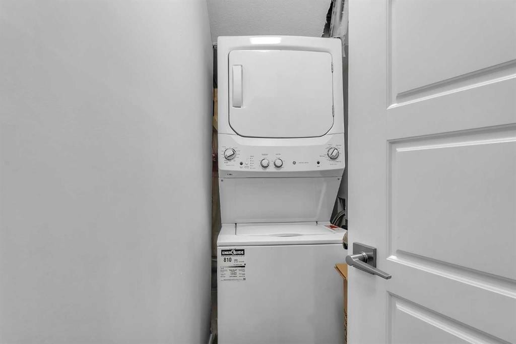 521 Corner Meadows Way Ne, Calgary, AB - Indoor Photo Showing Laundry Room