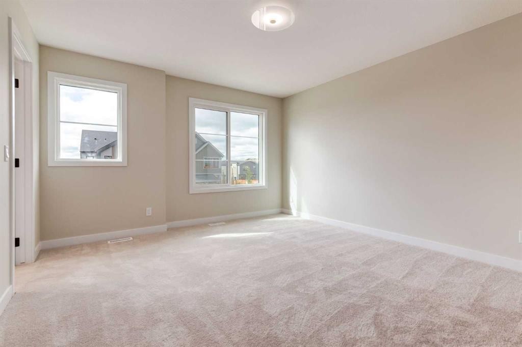 128 Heartwood Lane Se, Calgary, AB - Indoor Photo Showing Other Room