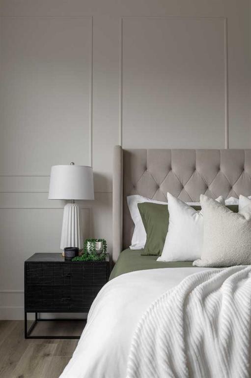 88 Sunrise Heath, Cochrane, AB - Indoor Photo Showing Bedroom