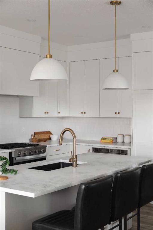 88 Sunrise Heath, Cochrane, AB - Indoor Photo Showing Kitchen With Upgraded Kitchen