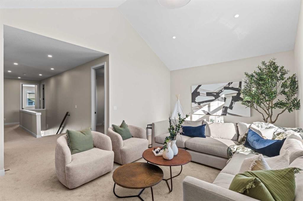 47 Sundown Crescent, Cochrane, AB - Indoor Photo Showing Living Room