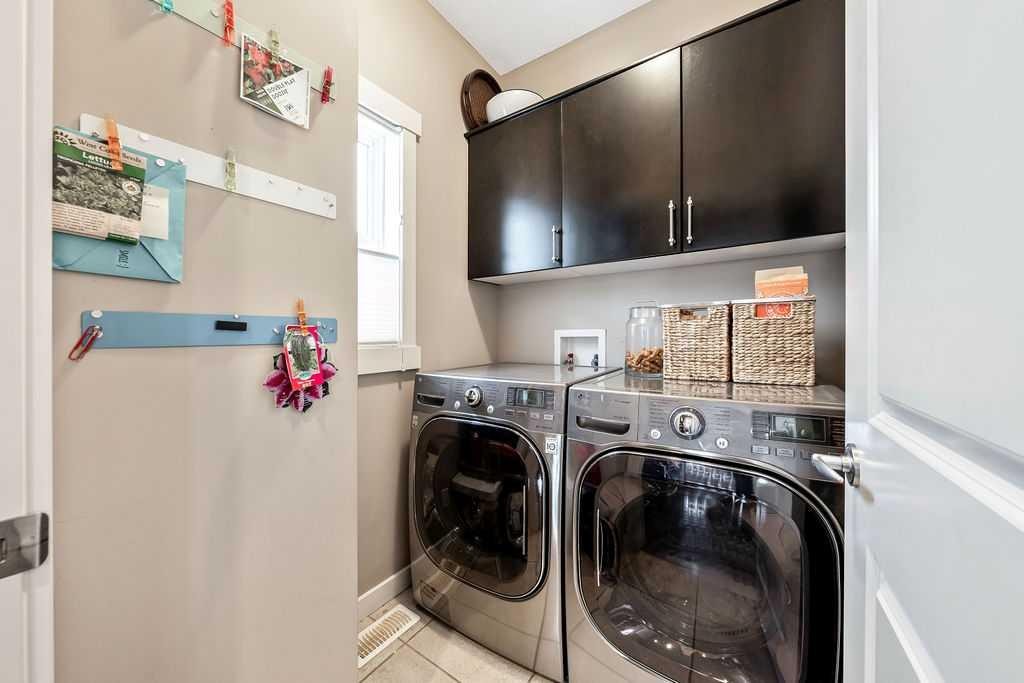 78 Ypres Green Sw, Calgary, AB - Indoor Photo Showing Laundry Room