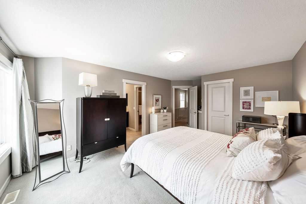 78 Ypres Green Sw, Calgary, AB - Indoor Photo Showing Bedroom