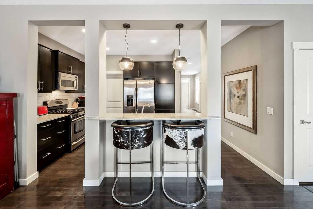 78 Ypres Green Sw, Calgary, AB - Indoor Photo Showing Kitchen With Upgraded Kitchen